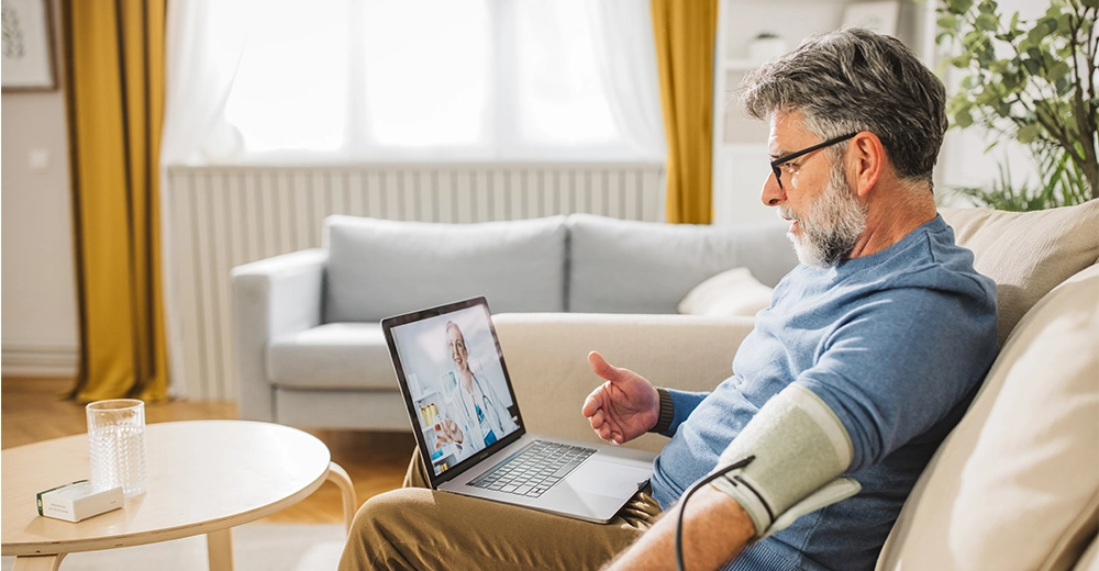 Doctor appointment at home using laptop