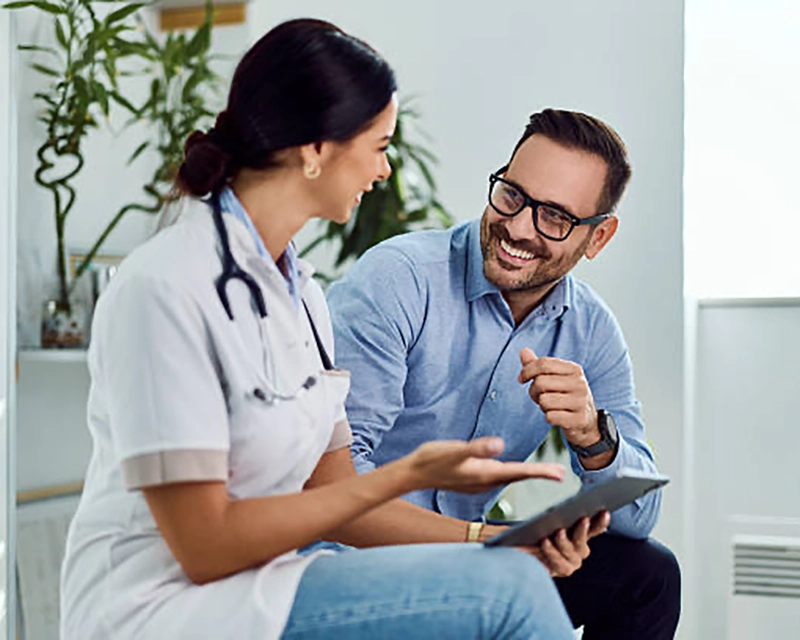 Provider in conversation with associate